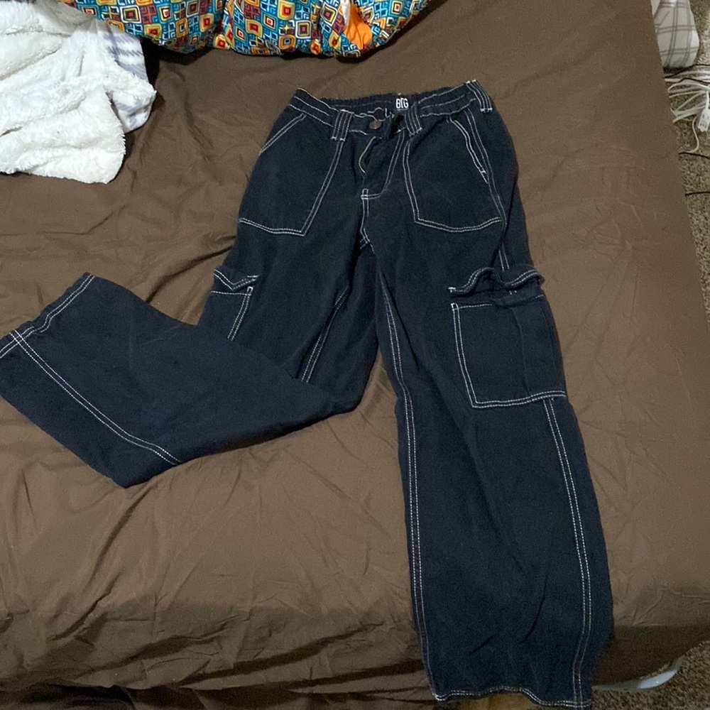 Black, wide legged skate pants. Black with white lining